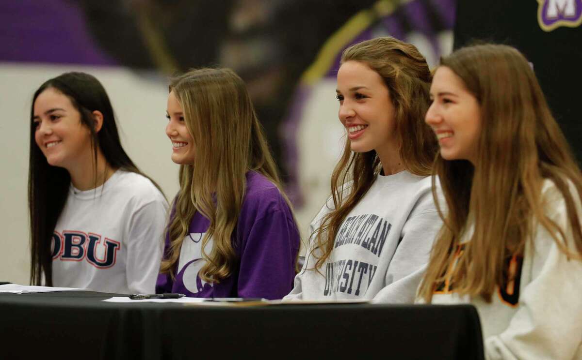 Eryn Garza, left, Remington Isaac, Riana McWhirter and Abbey Wilson signed national letters of intent during a national signing day ceremony at Montgomery High School, Wednesday, Nov. 11, 2020, in Montgomery.