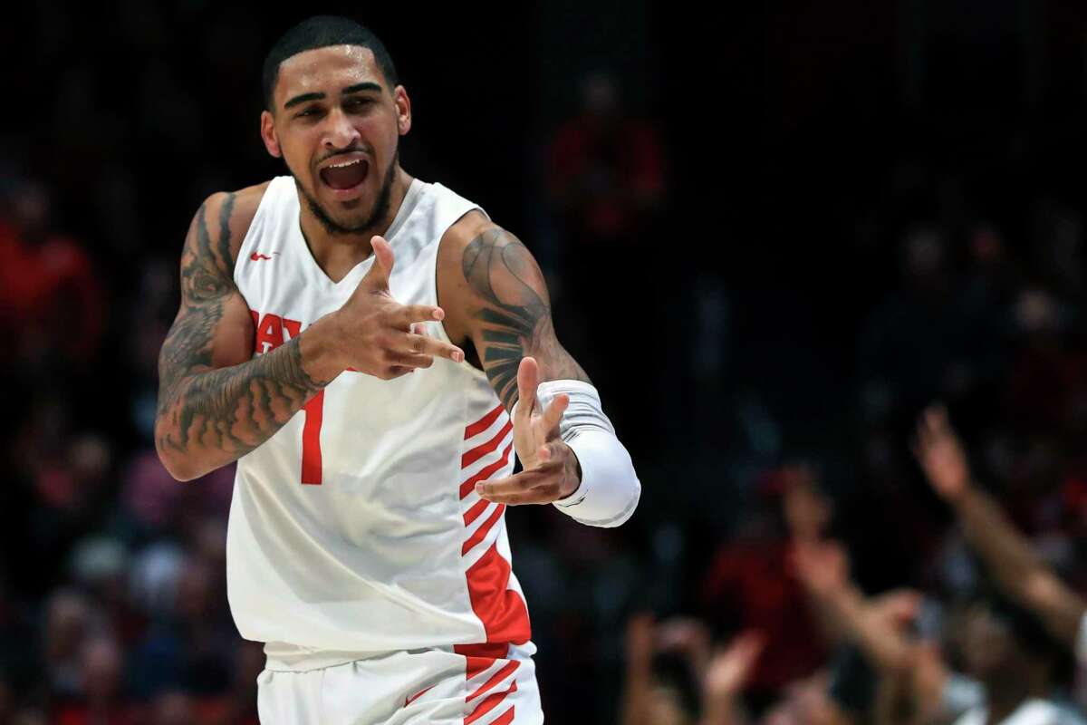 In this Feb. 11, 2020, file photo, Dayton’s Obi Toppin (1) reacts in the first half in an NCAA college basketball game against Rhode Island in Dayton, Ohio. Toppin was selected to the Associated Press All-America first team.