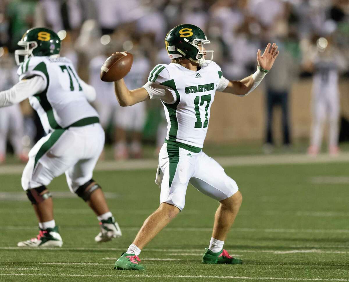 AJ Abbott (17) of the Stratford Spartans attempts a pass in the second half against the Memorial Mustangs during a High School football game on Friday, October 30, 2020 at Tully Stadium in Houston Texas.