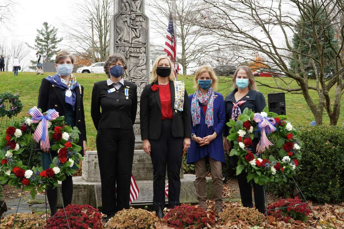 Members of the Hannah Benedict Carter Chapter of the Daughters of the American Revolution stood in front of the wreaths that were placed during the New Canaan Veterans Day ceremony, on Nov. 11, 2020 at God's Acre. From Left to right, Sarah Coleman, Rose Scott Rothbart, Lisa Melland, Susan Kniffen and Ellen Taylor Sisson. New Canaan’s most “illustrious” Revolutionary War Veteran will be part of America’s 250, a commission set up to celebrate America’s 250th year in 2026. Betts “had done so much to aide in the cause of American freedom,” Melland said. “On his own account he fought in 13 revolutionary battles,” and she has found evidence that he was at Valley Forge and at Yorktown. He received “a commendation from George Washington for his valiant efforts at the Battle of Norwalk,” Melland said. The local DAR also learned that Betts had a slave called Jessie Betts, who is buried near him in St. Mark’s Cemetery, located at the corner and Weed Street and Sunset Hill Road. “We have now included full researched information about Jessie Betts in the video,” she said. “Over the next years our chapter will do a deep research dive to determine other enslaved individuals, and patriots of color who are buried here in New Canaan,” Melland said.