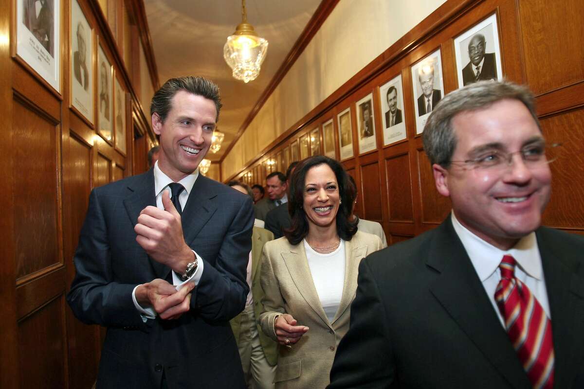 San Francisco Mayor Gavin Newsom, Kamala Harris and Dennis Herrera walk out of the mayors office in San Francisco, Calif. enroute to a press conference in the City Hall rotunda after hearing the California Supreme Court decision giving gays and lesbians the constitutional right to marry in California on Thursday, May 15, 2008. In a 4-3 decision, the justices said the state's ban on same-sex marriage violates the "fundamental constitutional right to form a family relationship." Photo by Lance Iversen / San Francisco Chronicle.