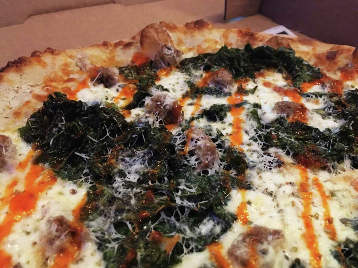 Playland has creative names for the pizzas, such as this one called Is There A Problem Here, which has kale, sausage, pepperoni, honey and three different types of cheese.