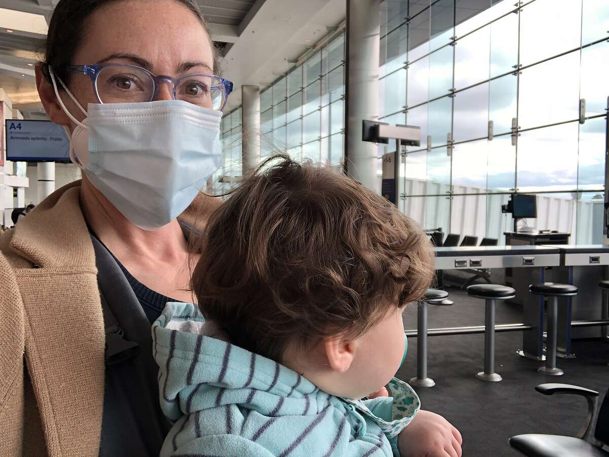 Chronicle Culture Desk editor Sarah Feldberg and her daughter at Baltimore/Washington International Airport. Feldberg flew to the East Coast with her husband in late October to visit family and tried to take careful precautions to avoid getting the coronavirus or bringing it with them.