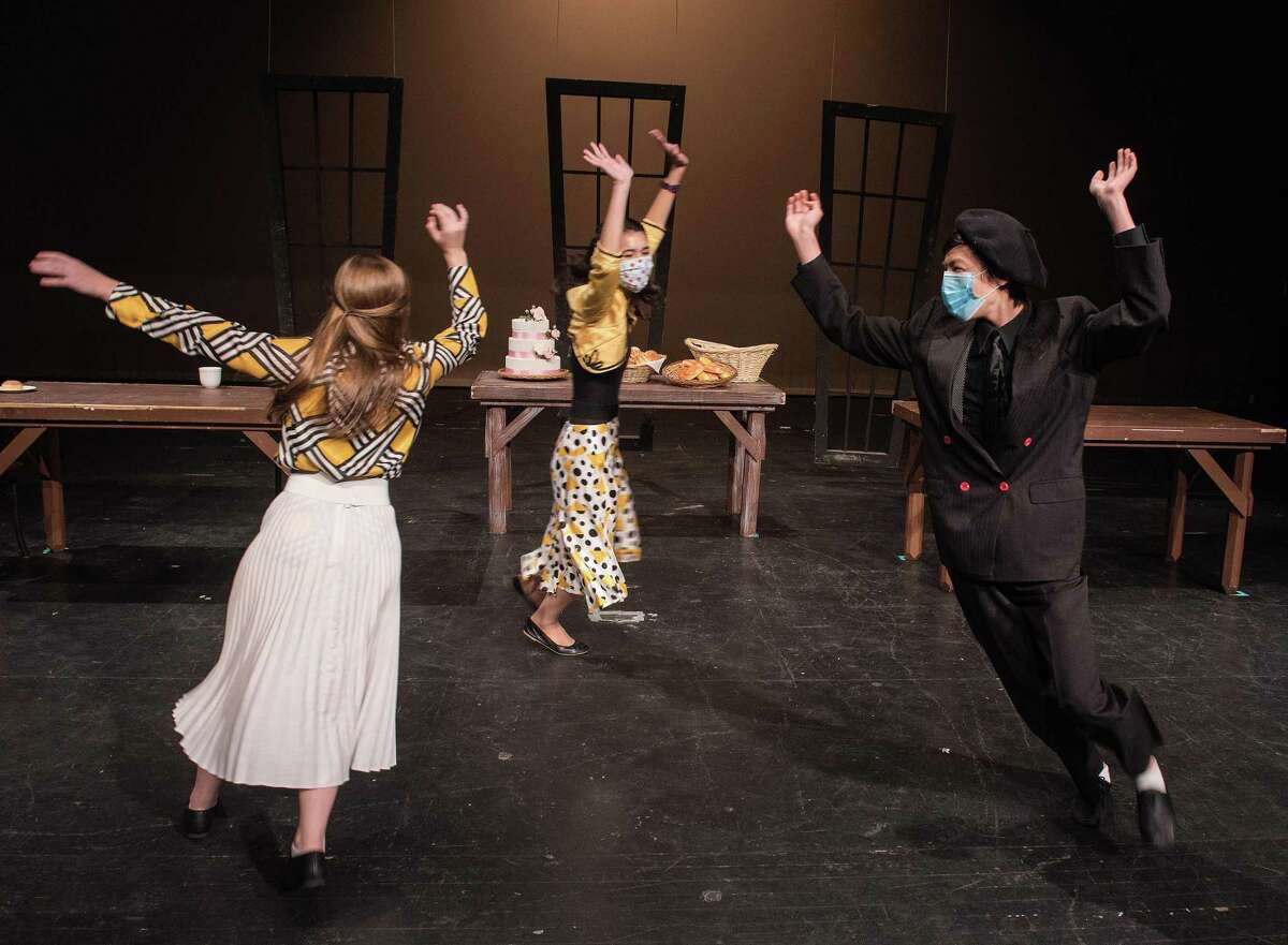 Emmy Baer, Aki Lasher, Matthew Huang perform in Wilton High School Theatre’s production of “All in the Timing” this past academic school year, in Wilton, Connecticut. Students in the production have received award nominations for the production.