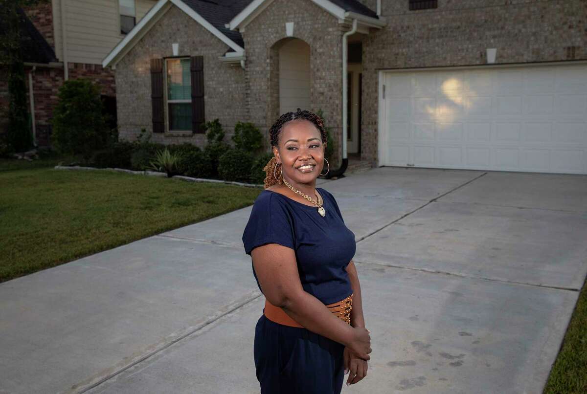 Angel Tillman poses for a portrait Friday, Nov. 6, 2020, at her home in Pearland.