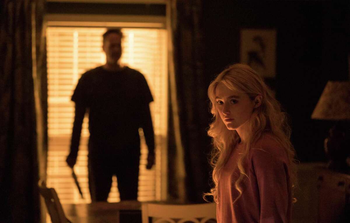 This image released by Universal Pictures shows Kathryn Newton and Vince Vaughn, left, in a scene from "Freaky." (Brian Douglas/Universal Pictures via AP)