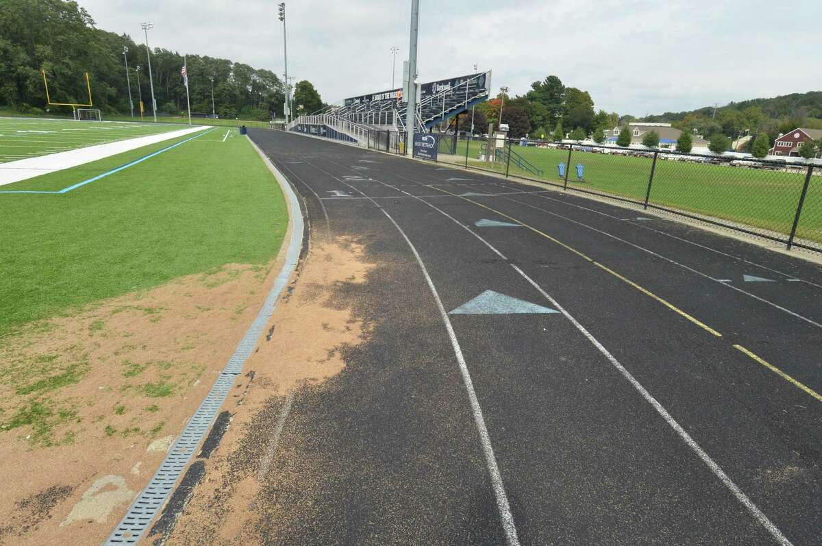 The running track at Wilton High School on Tuesday, October 2, 2018, shows signs of wear and deterioration. The Board of Finance voted on Tuesday, November 10, 2020 to authorize bonding up to $1,225,000 to replace the track with one that meets International Amateur Athletic Foundation standards.