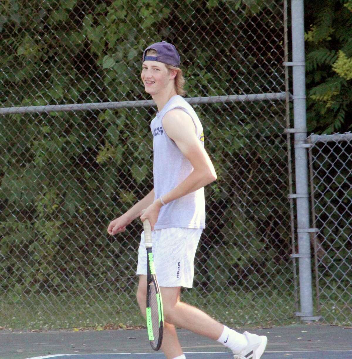 Spencer Olen, the lone senior on the Big Rapids tennis team, finishes his Cardinal career with 65 total wins. (Pioneer photo/John Raffel)