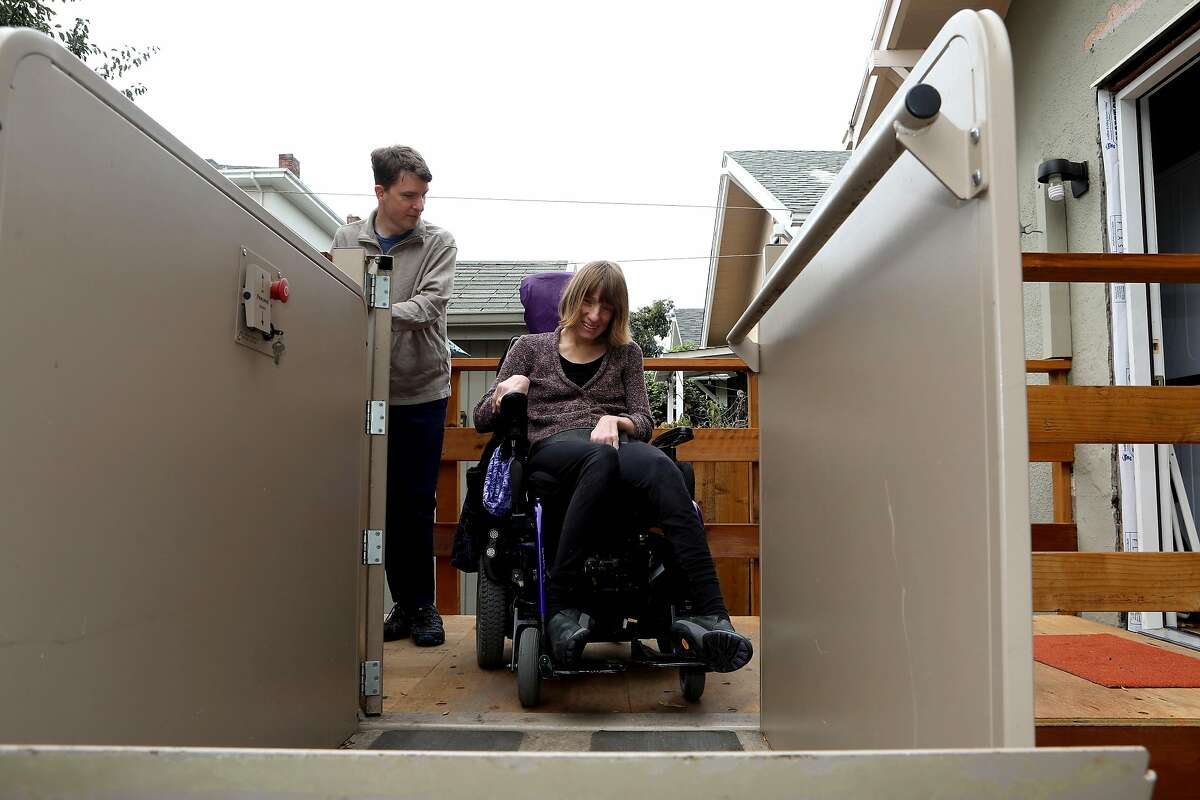 Owen and Melissa Cooper at their new home on Wednesday, November 11, 2020, in Oakland, Calif. Under Prop. 19, homeowners who are over 55 or severely disabled can sell their primary residence and buy a new one, anywhere in the state, of any value, and transfer their tax base from their old home to their new home, avoiding a tax increase. Owen Cooper and his wife Melissa, are both disabled. This year, they were finally able to buy a one-story house near transit. They were just about to put their condo on the market when they learned about Prop. 19. Under current law, they could not transfer the tax base from the condo to new home because the new one cost a lot more. However, just before election day they realized under Prop. 19, if they wait until April 1, they might be able to transfer the tax base from old to new home. However, it's unclear whether they would need to both sell the old one and buy the new one after April 1, or whether if they hold off on selling the condo until April 1 they will qualify for the new tax break. Many other seniors and disabled people who are in the midst of buying and selling a home are in the same boat and waiting for the Board of Equalization or the Legislature to make a decision on this.