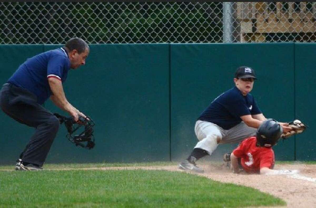 Beloved North Branford, Conn. Little League baseball umpire, the late Lewis "Lou" Paternoster, at a July 2014 game as third baseman Aiden Cole catches the ball. Photo provided by Aiden Cole’s father, Gary Cole. Not your average umpire Lou Paternoster grew up in the Trumbull area and attended Trumbull High School, according to Betty Jo Paternoster. The couple moved to North Branford in the 1980s, after marrying and living for a few months in Virginia, where they met on a business trip, she said. Over the years, Lou Paternoster coached various sports teams, served on athletic boards, umpired baseball games and refereed basketball games. But he wasn’t your average volunteer. State Rep. Vincent Candelora, who represents North Branford in the state legislature and knew Paternoster through coaching, said he had a knack for making every kid feel special. “The one thing about Lou - he’s great with kids,” Candelora said. “This death is going to affect kids as much as adults.” Mascari, who knew Paternoster through sports, remembered one basketball game Paternoster refereed where he kept calling fouls on one team so that a struggling player on the other could make free throws. “[Lou] would always give a kid a break and always try to make a kid, you know, feel good about himself,” he said.