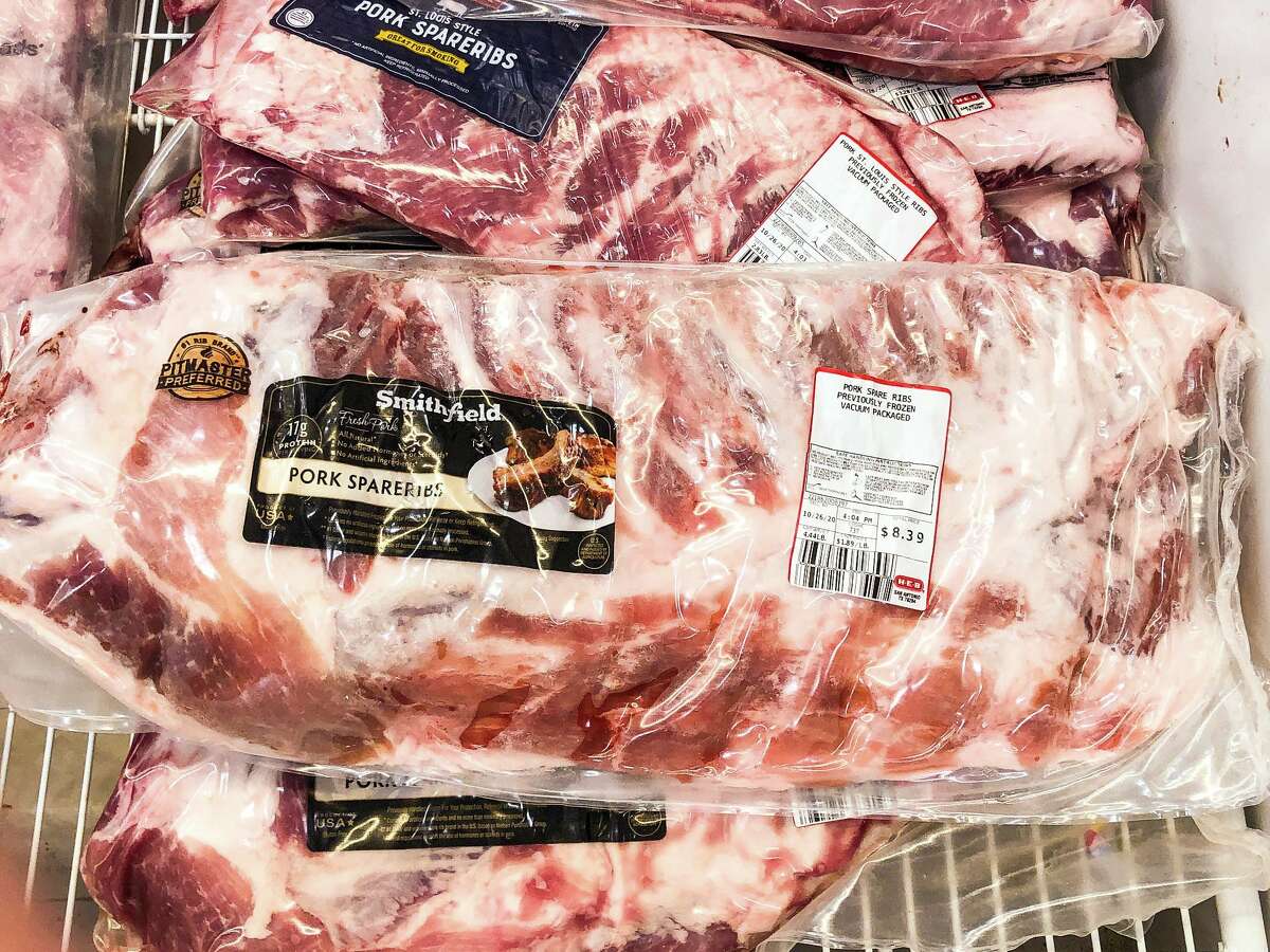 Pork spareribs in the H-E-B meat aisle. For a backyard barbecue, 4-5 pound pork sparerib racks work great.