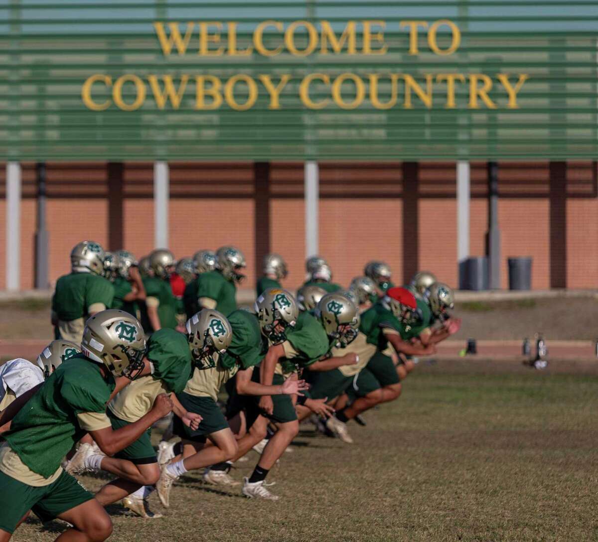 The McCollum Cowboys run through drills Wednesday, Nov. 11, 2020 as they prepare for their first game after having to forfeit three games due to positive COVID-19 coronavirus tests.