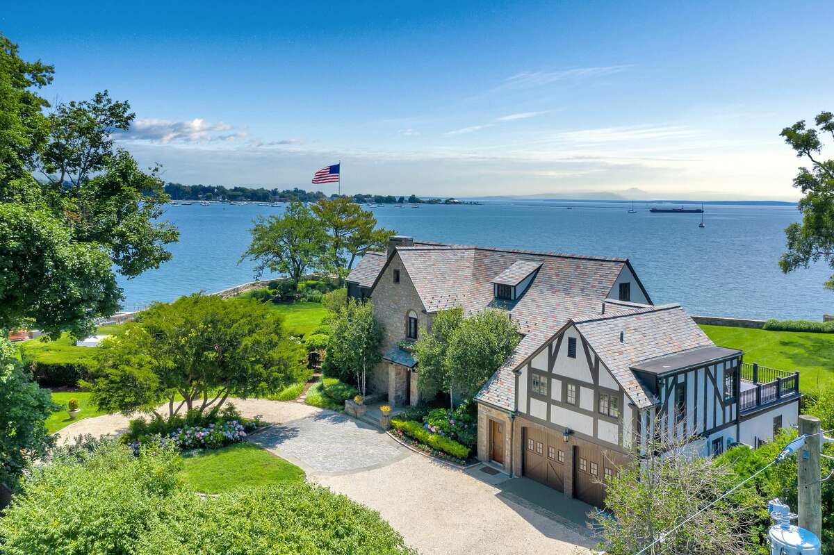 Waterfront home located at 236 Davenport Drive in Stamford, Connecticut.  The home at 236 Davenport Drive was not on the market for long. It was listed in July for $5.75 million and went into contract in August until a deal was struck at the end of October, according to the Senior Vice President of Communications at Browns Harris -- which recently merged with Halstead-- Ashley Murphy. 