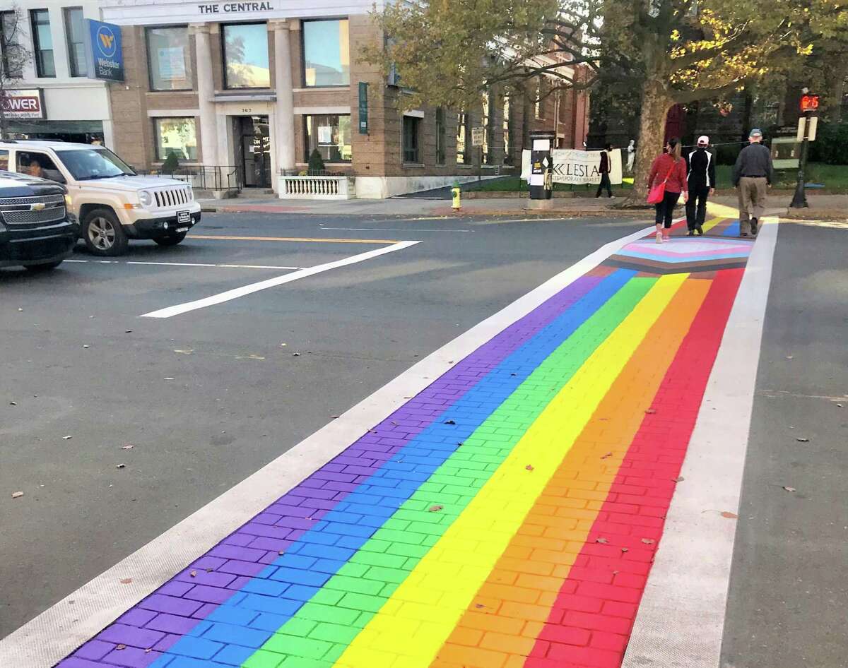 Middletown recently commissioned artist Brian Colbath to repaint the crosswalk in front of Main Street Market, at 386 Main St., in LGBTQIA colors as part of Middletown Pride’s year-round observance. Colbath is also creator of the Gay Pride Month rainbow flag at West Hartford’s Blue Back Square located near the West Hartford Public Library.