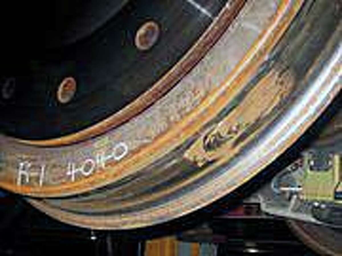Metro-North Railroad provided a photo of a train's tire that has undergone damage from slip-slide conditions. With rain and wet leaves falling on Thursday, Nov. 12, 2020, Metro-North was reporting train delays because of