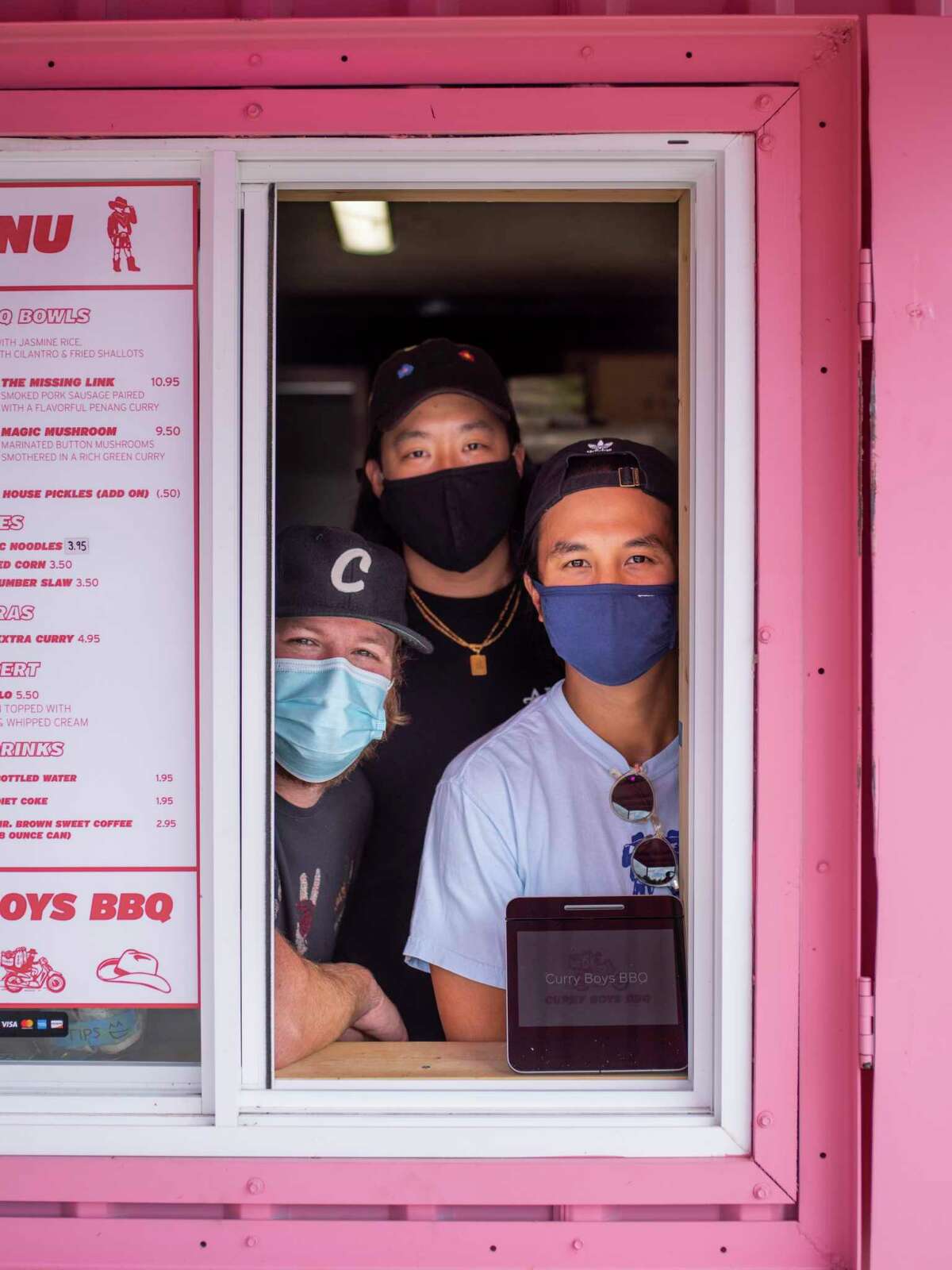 Pinch Boil House partners Sean Wen, second left, and Andrew Ho, right, and South BBQ & Kitchen owner Andrew Samia, left, teamed up together to open Curry Boys BBQ last month in San Antonio, Tx., on Thursday, November 12, 2020.