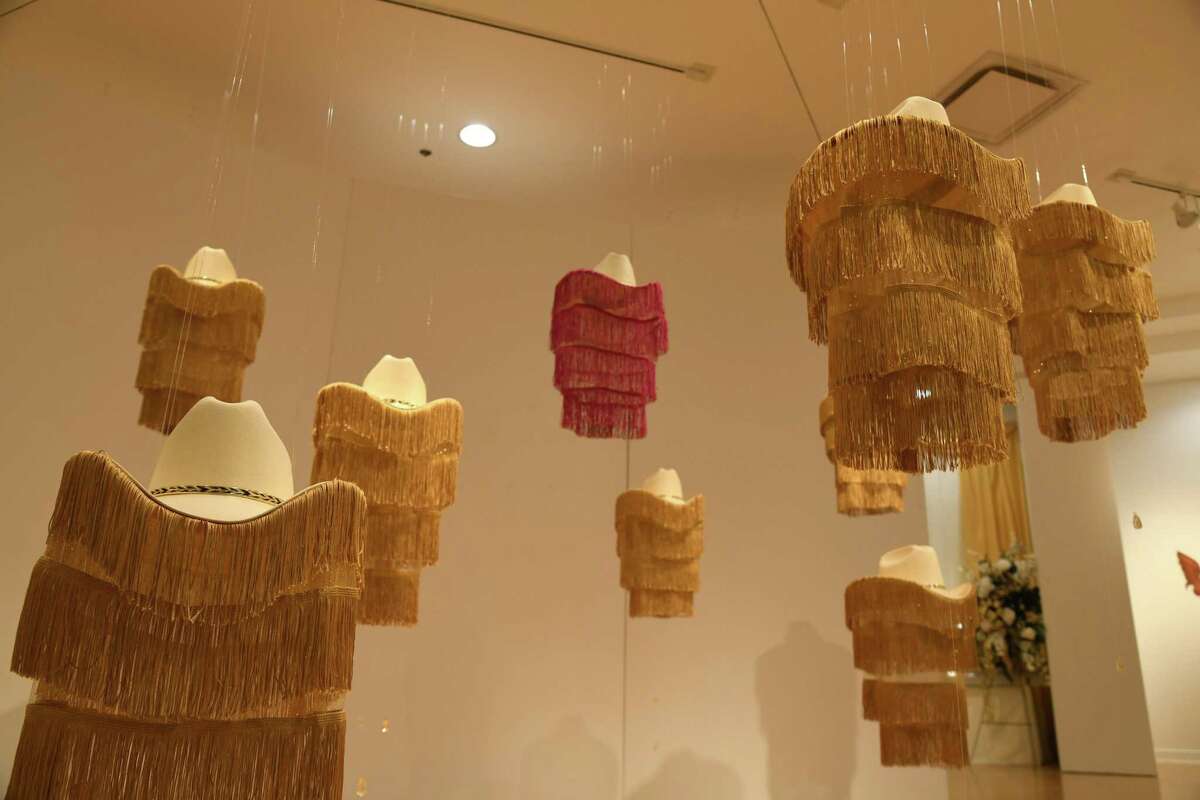 Jose Villalobos' exhibit, J--- Fronterizo, showcases different cultural norteno pieces at the TAMIU art gallery.