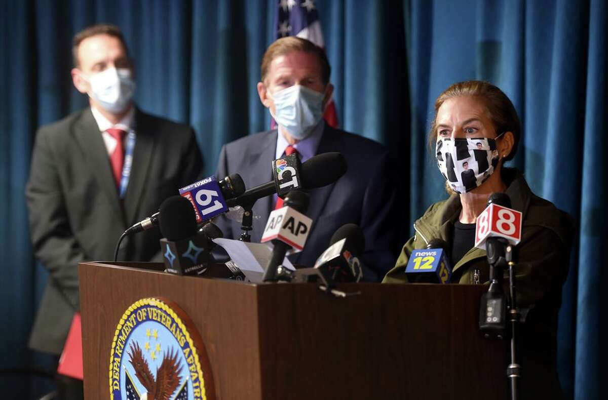From left, Alfred Montoya, Jr., medical director of the VA Connecticut Healthcare System, and U.S. Sen. Richard Blumenthal listen to Lt. Gov. Susan Bysiewicz speak at a press conference following an explosion at the boiler plant at the West Haven Veterans Affairs medical center campus that took two lives Nov. 13, 2020.