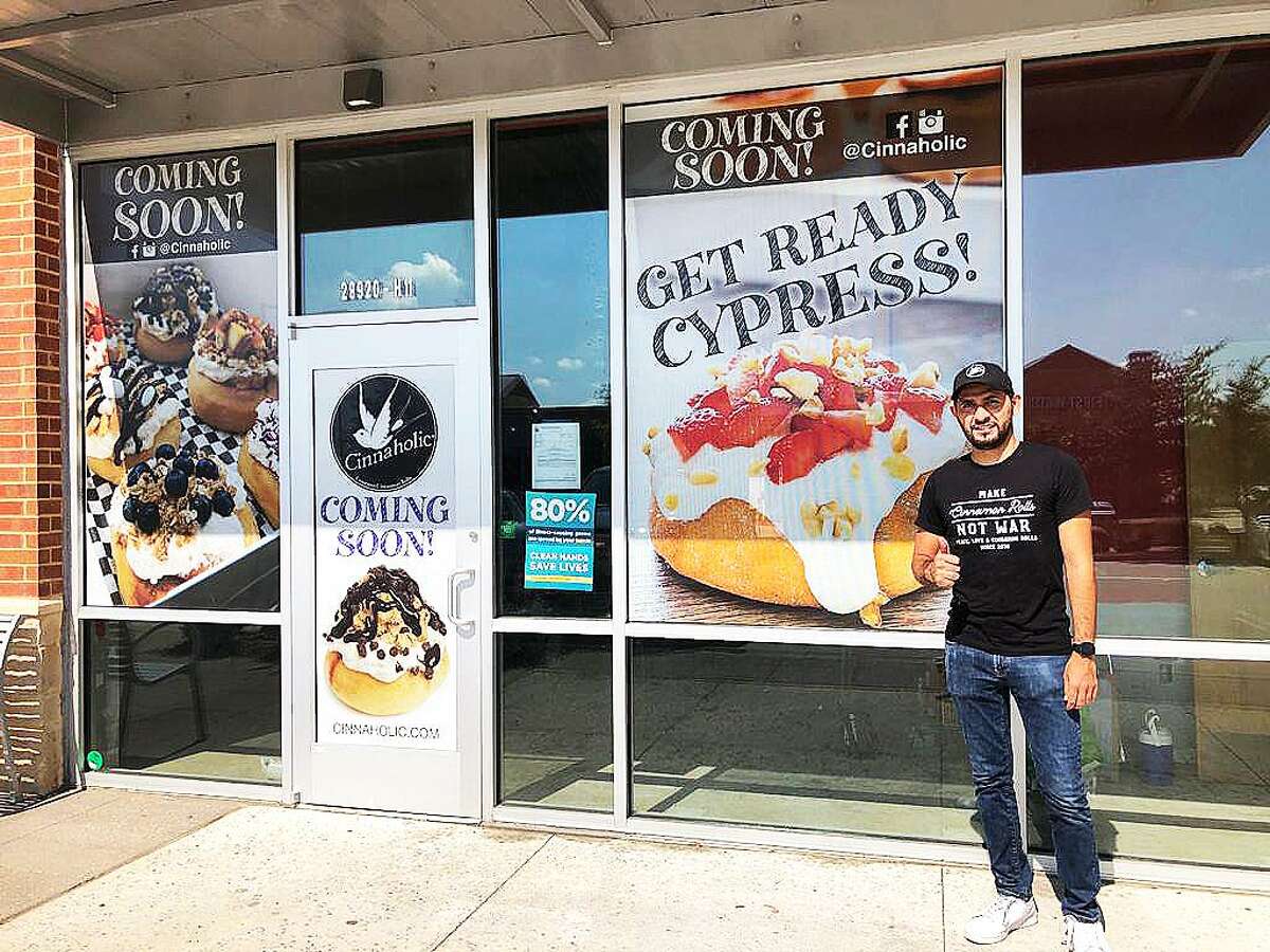 Héctor Figueroa stands outside the new Cypress Cinnaholic store located at 28290 Northwest Freeway, Ste. H-11 in Fairfield Town Center. The grand opening is set for Friday, Nov. 20 at 11 a.m.