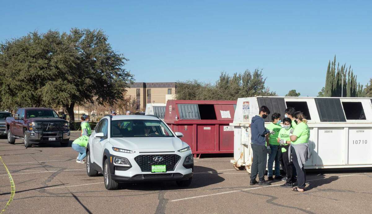 Volunteers help Midlanders get rid of old or unwanted items to be recycled as part of Keep Midland Beautiful 14th Annual Texas Recycles Day at Midland College Chaparral Center parking lot in this file photo. Reporter-Telegram