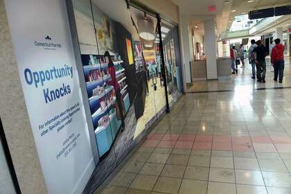 An empty store available for lease at the Connecticut Post Mall in Milford has a mural decorating the space on Oct. 14, 2020.