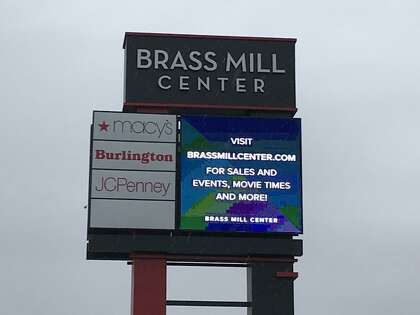 In this file photo, The sign at the entrance to the Brass Mill Center mall in Waterbury.