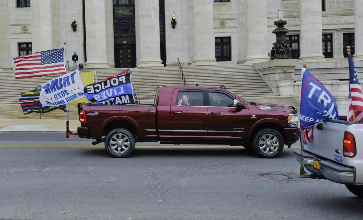 Supporters of President Donald Trump drive around the state Capitol and the downtown area on Sunday, Nov. 15, 2020, in Albany, N.Y. (Paul Buckowski/Times Union)