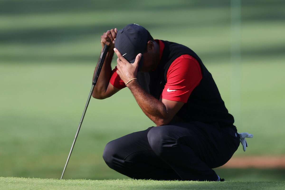 Tiger Woods reacts on No. 7 at Augusta National, which he bogeyed Sunday. He finished with a 76, and tied for 38th place at 1-under for the Masters.