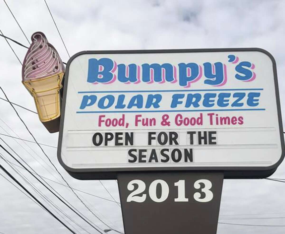 A sign for the now-defunct Bumpy's Polar Freeze. Another new owner has taken over the location with a creamery and cake shop.