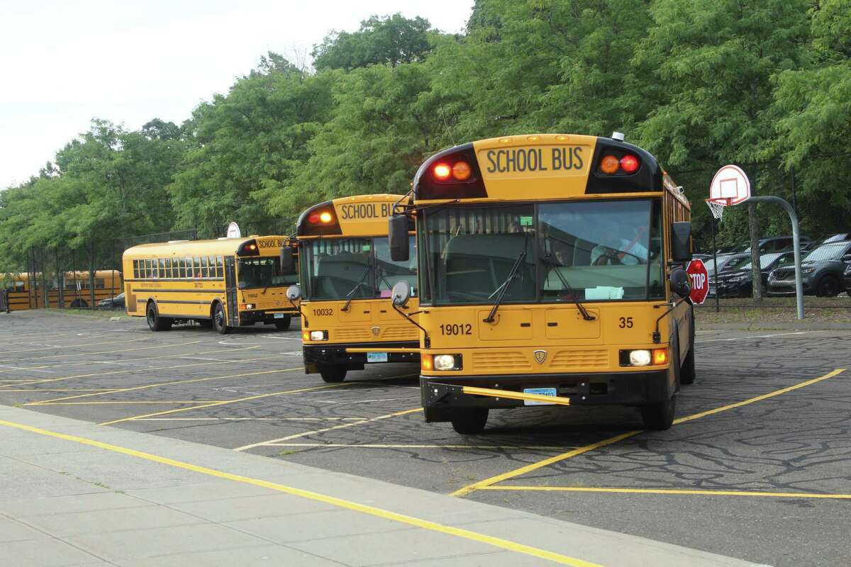 School buses arrive at Bedford Middle School to kickoff the 2019 school year in Westport. Taken Aug. 27, 2019 in Westport, CT.