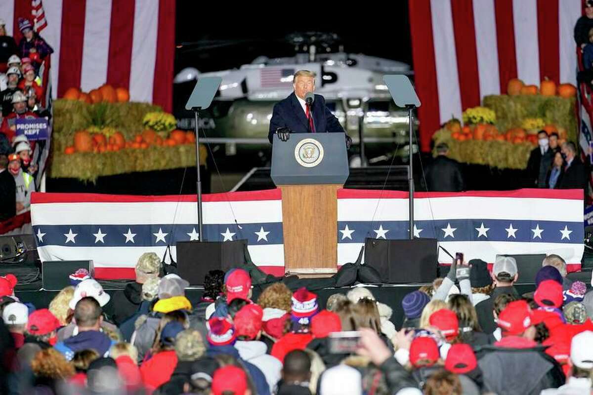 President Donald Trump addresses the crowd during a campaign stop, Saturday, Oct. 31, 2020, at the Butler County Regional Airport in Butler, Pennsylvania.