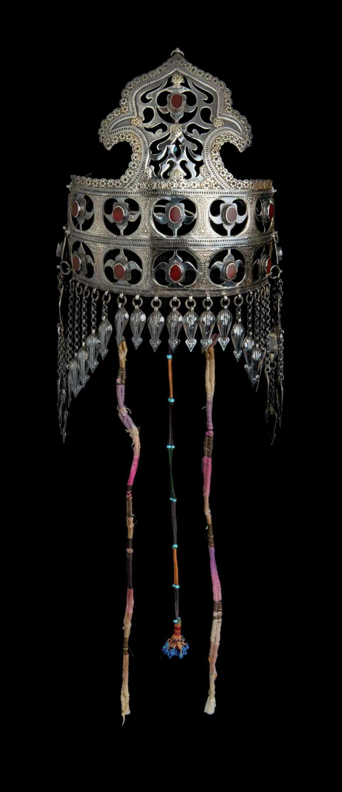 This silver headdress, or bridal diadem, was crafted in Turkmenistan. Many of the pieces on display symbolize fertility.
