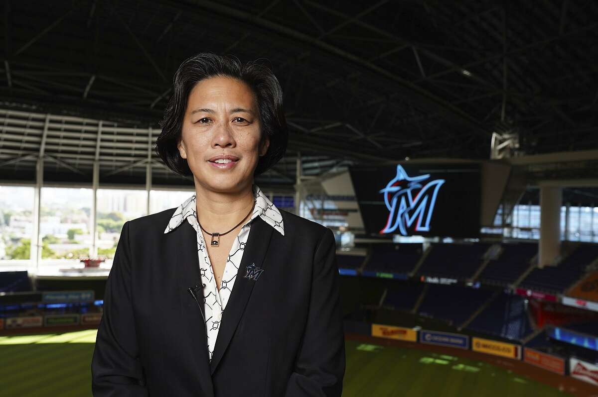 In this photo provided by the Miami Marlins, new Miami Marlins general manager Kim Ng poses for a photo at Marlins Park stadium before being introduced during a virtual news conference, Monday, Nov. 16, 2020, in Miami. Ng discussed her climb to become the first female GM in the four major North American professional sports leagues.
