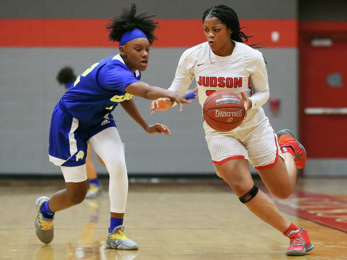 Judson's Kierra Sanderlin, right, tries to drive past Clemens' Aysia Proctor during their District 26-6A girls basketball game at Judson on Friday, Jan. 24, 2020. Sanderlin led all scorers with 21 points to help Judson beat Clemens 63-34.
