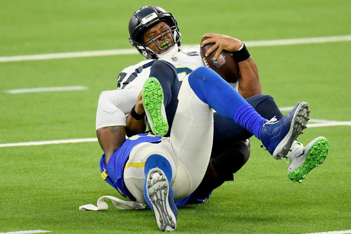 Carroll Seattle Seahawks QB Wilson 'busting his ass' to clean up