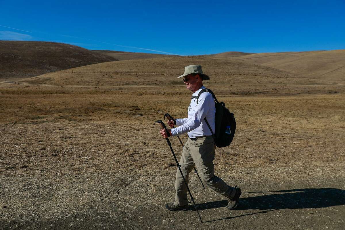 Mark Kluver hikes on a trail in Brushy Peak Regional Preserve on Monday, Nov. 16, 2020 in Livermore, California.