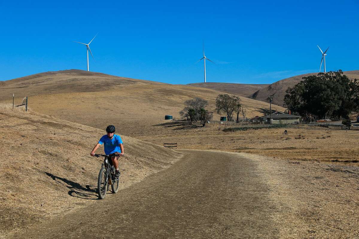 A man bikes on a trail in Brushy Peak Regional Preserve on Monday, Nov. 16, 2020 in Livermore, California.