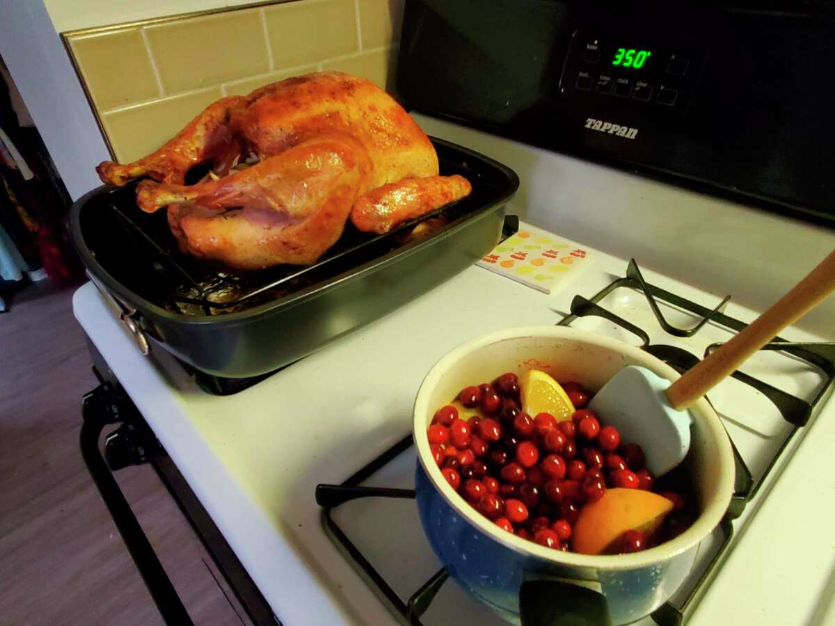 I let the turkey rest while I winged the cranberry sauce, which was a simple compote of cranberries, oranges, water, sugar and cinnamon. I ended up adding corn starch to thicken it up. (Ashley Schafer/ashley.schafer@hearstnp.com)