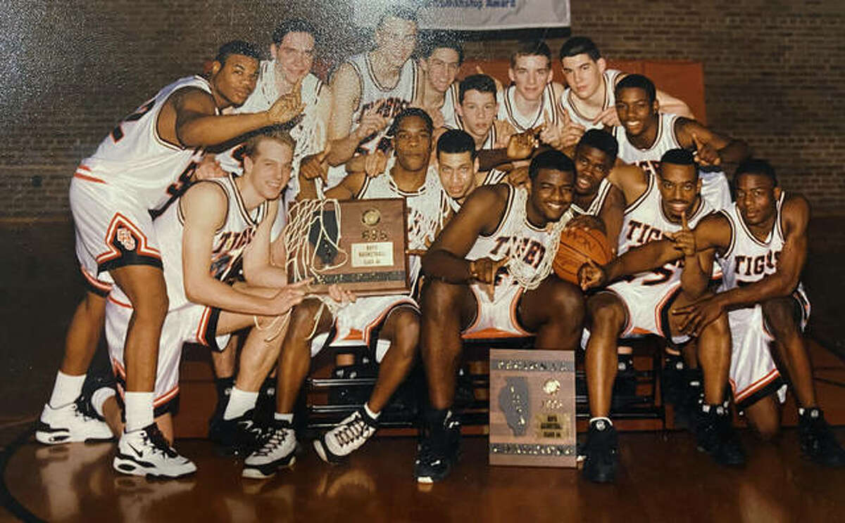 Mark Thomas, front row right, and his Edwardsville teammates pose for a photo after the 1994-95 season, when the Tigers won regional, sectional and super-sectional titles and reached the Elite Eight in Class AA.