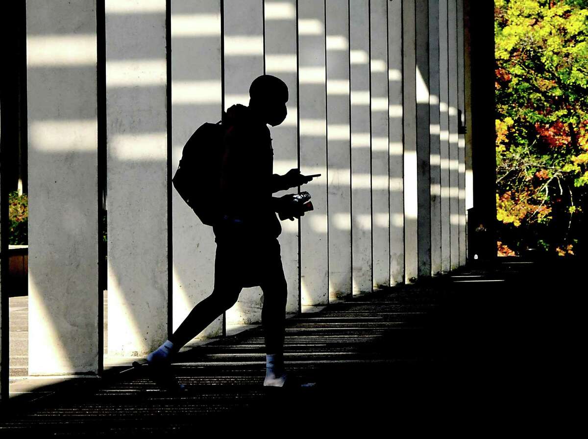 A student is seen walking near the campus center of University at Albany on Friday, Sept. 25, 2020 in Albany, N.Y. (Lori Van Buren/Times Union)