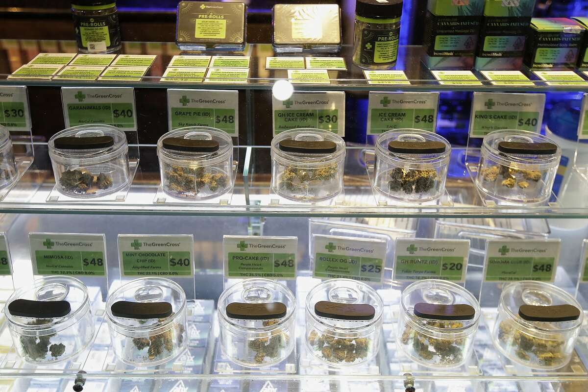 A variety of marijuana buds for sale are displayed at the Green Cross cannabis dispensary in San Francisco, where cannabis sales tax receipts have topped expectations in part because marijuana dispensaries have been declared essential businesses and remain open.