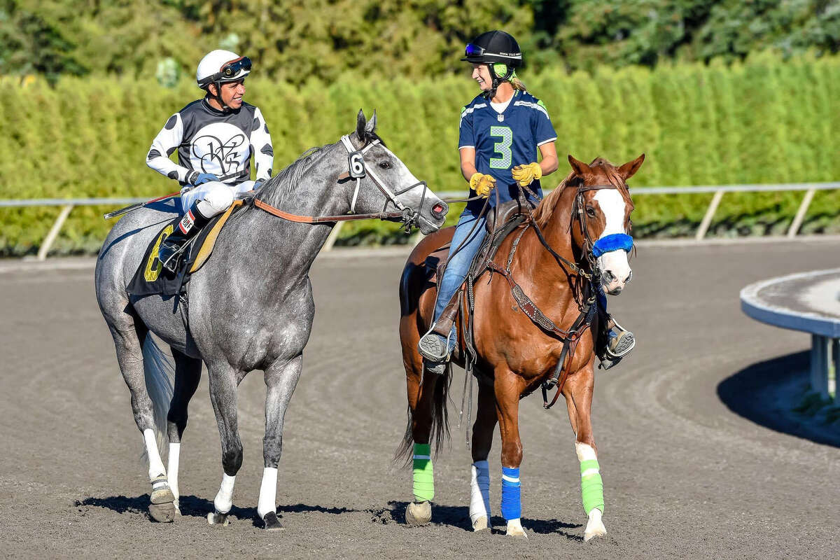 Rider Robbie Baze and racehorse Callex, left, alongside Angela Couton riding Nosey, right.