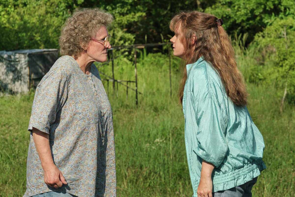 This image released by Netflix shows Glenn Close, left, and Amy Adams in a scene from "Hillbilly Elegy." (Lacey Terrell/Netflix via AP)