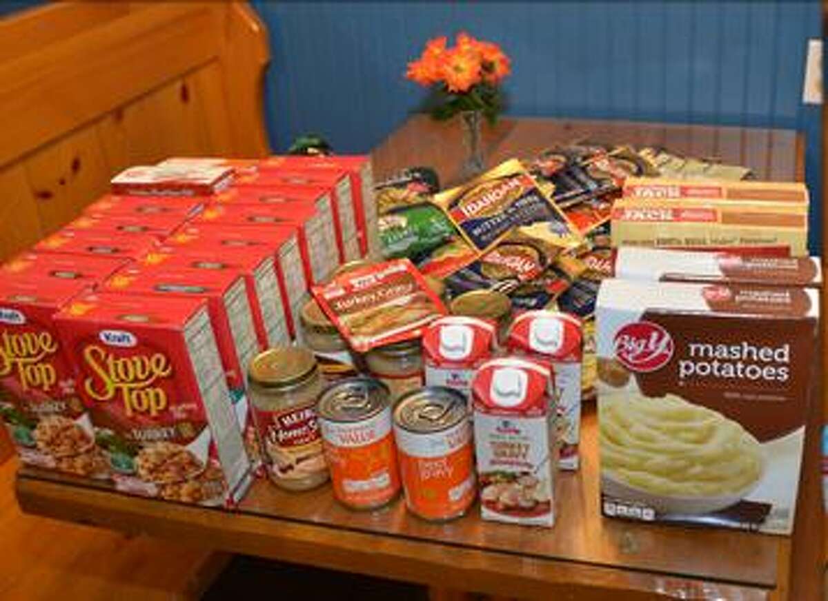 Students help organizations collect food for holidays