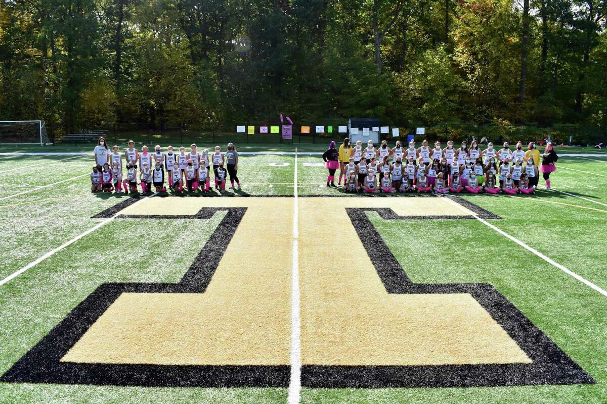 Trumbull Youth Field Hockey's grades 5/6 (left) and grades 7/8 met in a Play for Pink game to raise money to help fight breast cancer.