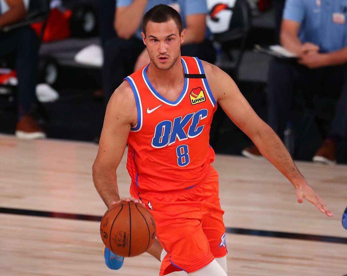 Danilo Gallinari #8 of the Oklahoma City Thunder moves the ball against the Memphis Grizzlies during the first half of an NBA game at Visa Athletic Center at ESPN Wide World Of Sports Complex on August 7, 2020 in Lake Buena Vista, FL. (Kim Klement/Pool/Getty Images/TNS)
