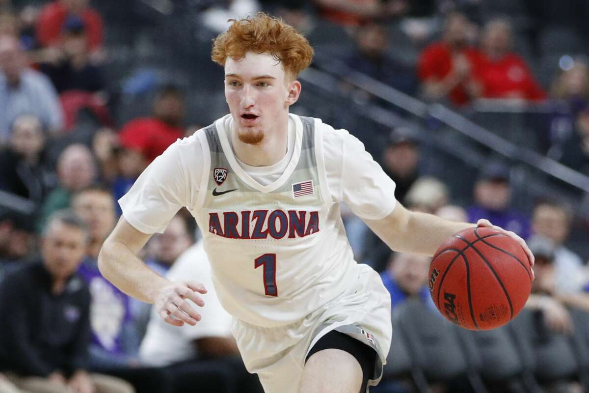 Arizona's Nico Mannion plays against Washington during an NCAA college basketball game in the first round of the Pac-12 men's tournament Wednesday, March 11, 2020, in Las Vegas. (AP Photo/John Locher)