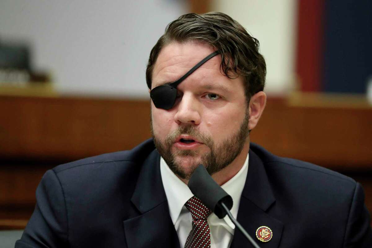 Rep. Dan Crenshaw, R-Texas, questions witnesses during a House Committee on Homeland Security hearing on 'worldwide threats to the homeland', Thursday, Sept. 17, 2020 on Capitol Hill Washington. (Chip Somodevilla/Pool via AP)