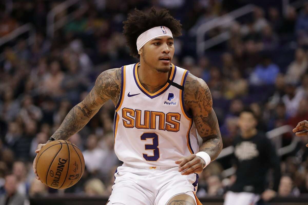 Phoenix Suns forward Kelly Oubre Jr. (3) plays against the Golden State Warriors during the second half of an NBA basketball game, Wednesday, Feb. 12, 2020, in Phoenix. A person with knowledge of the situation says All-Star guard Chris Paul is being traded from the Oklahoma City Thunder to the Phoenix Suns, where he'll play alongside one of the league's most dynamic young scorers in fellow All-Star Devin Booker. The Thunder are acquiring Ricky Rubio, Kelly Oubre, Jalen Lecque, Ty Jerome and a first-round pick that will be conveyed sometime between 2022 and 2025, said the person who spoke to The Associated Press on condition of anonymity because the trade had not been finalized by the league.