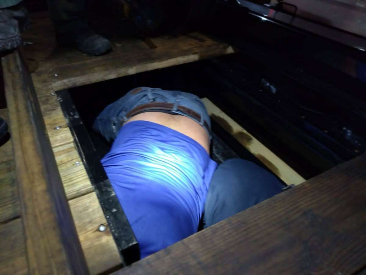 U.S. Border Patrol agents discovered 26 immigrants inside a false compartment of a flatbed trailer.